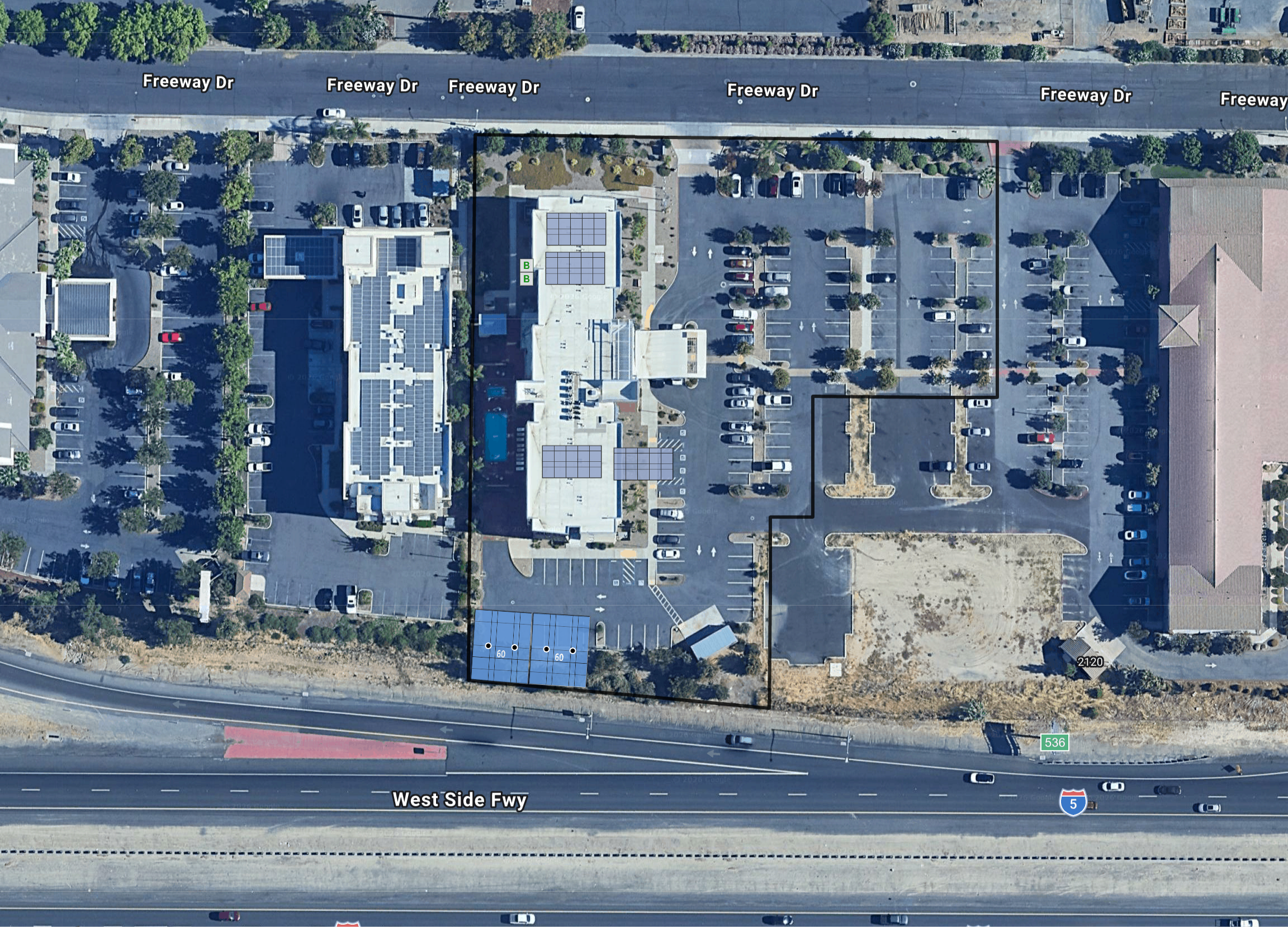System layout — solar carports and rooftop arrays at WOODLAND